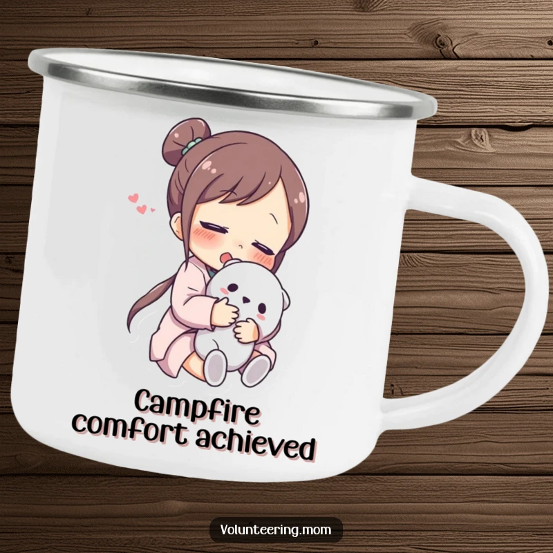 Funny Camping Mug: A sturdy enamel mug showcasing a mom character in a warm hug with a cuddly toy, looking content.