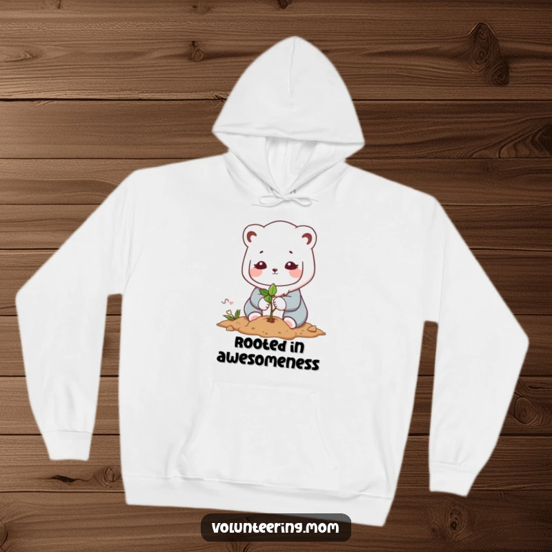 Funny Kawaii mom animal character hoodie, featuring the gentle act of planting a small sapling, offering warmth and a touch of nature.