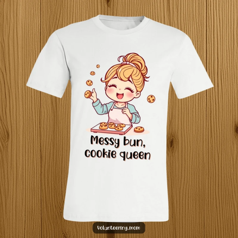 Funny mom character with a messy bun joyfully baking cookies, printed on a comfortable t-shirt.