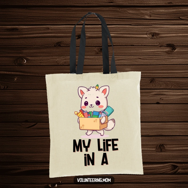 Funny animal artist tote bag with a box overflowing with colorful art supplies, celebrating creativity and practicality.